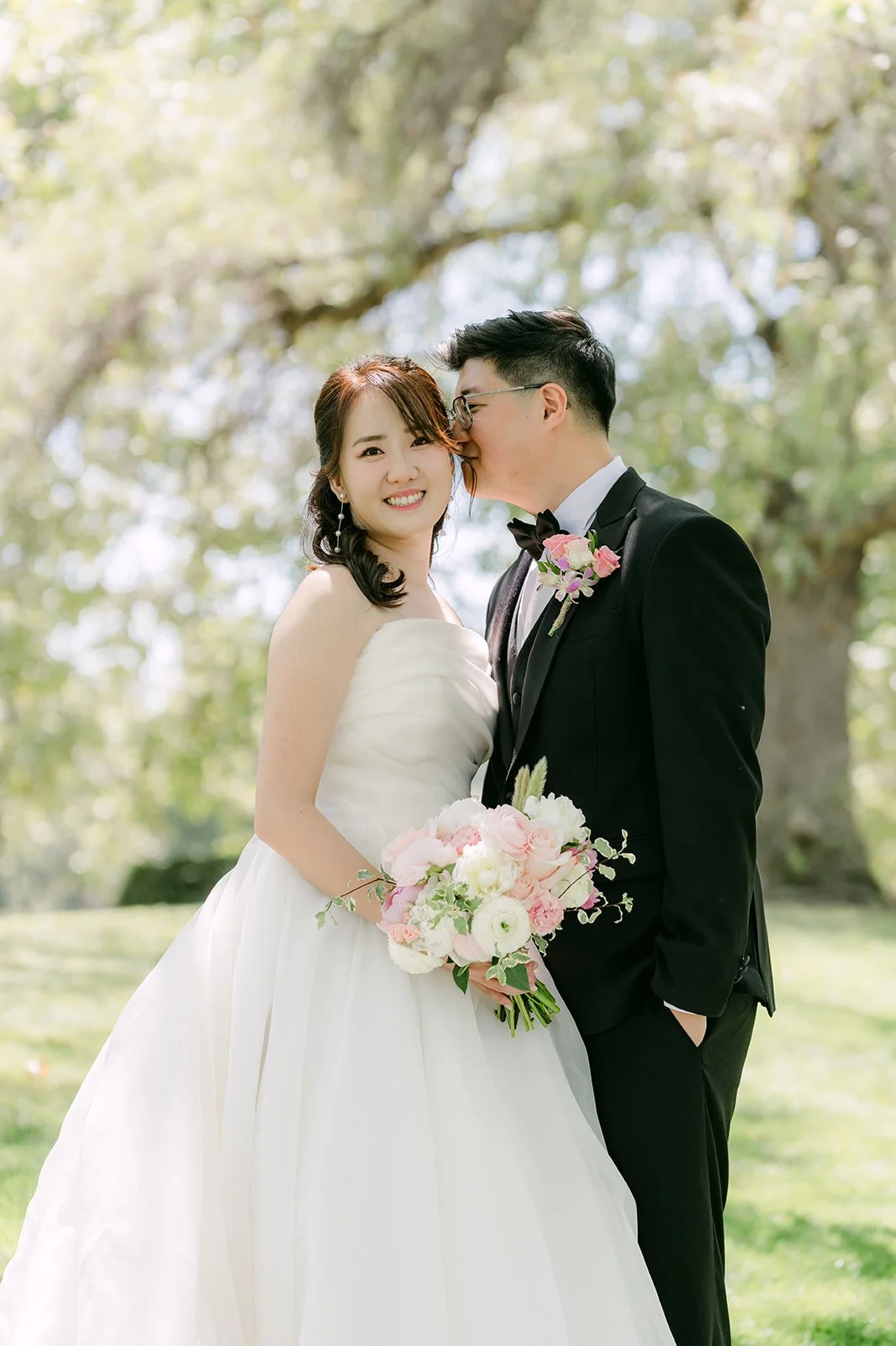 Judy and Joshua close together on the lawn