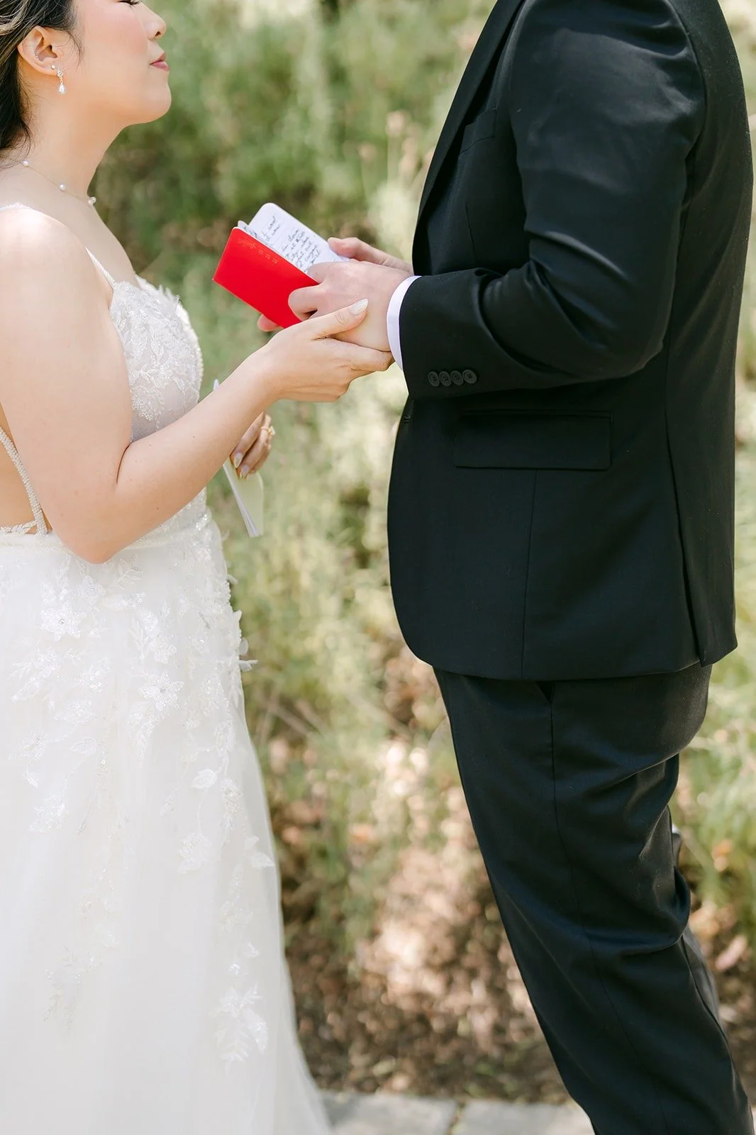 Zach reading his vows to Joanne from his vow book