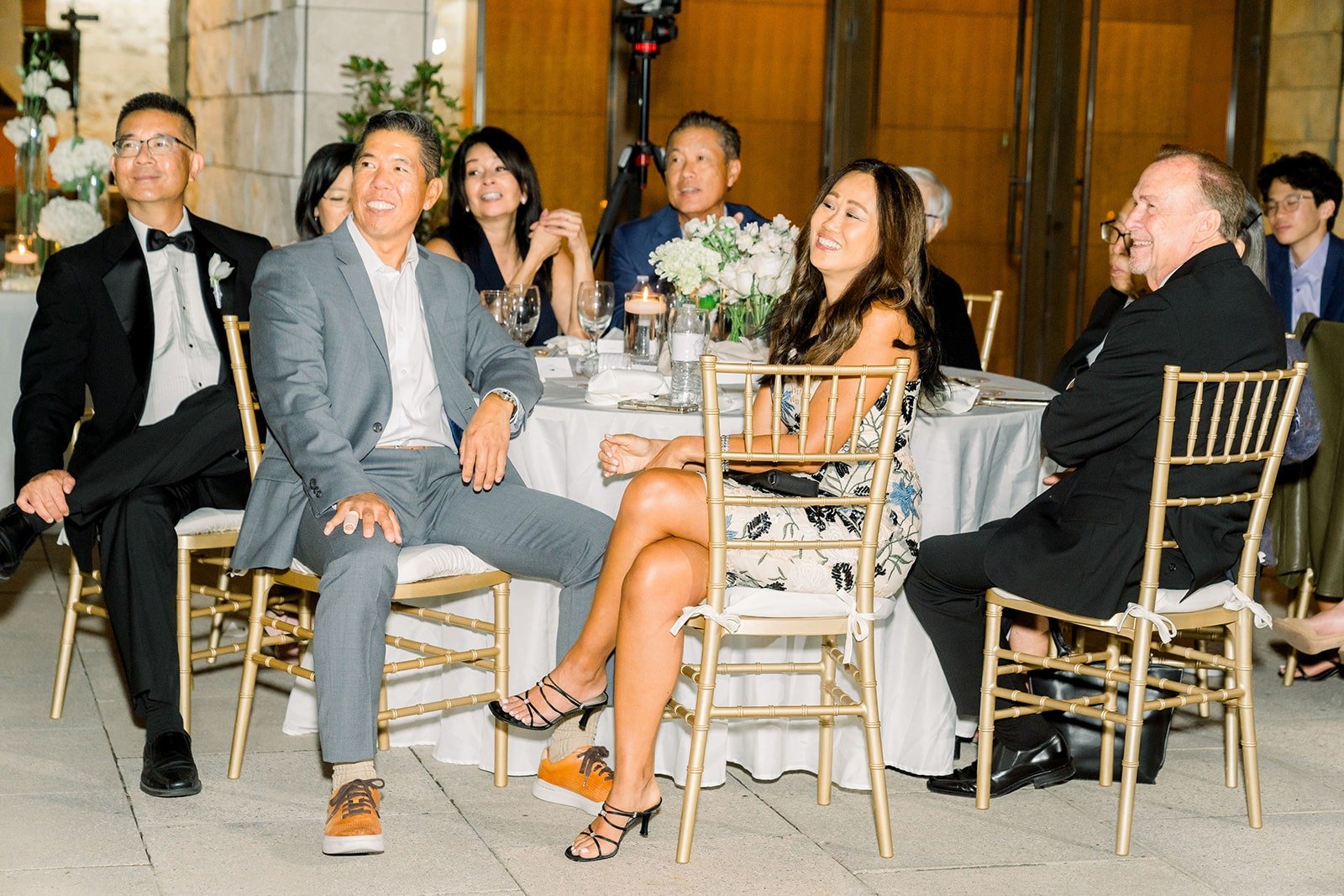 Guests listen to the speeches from their tables