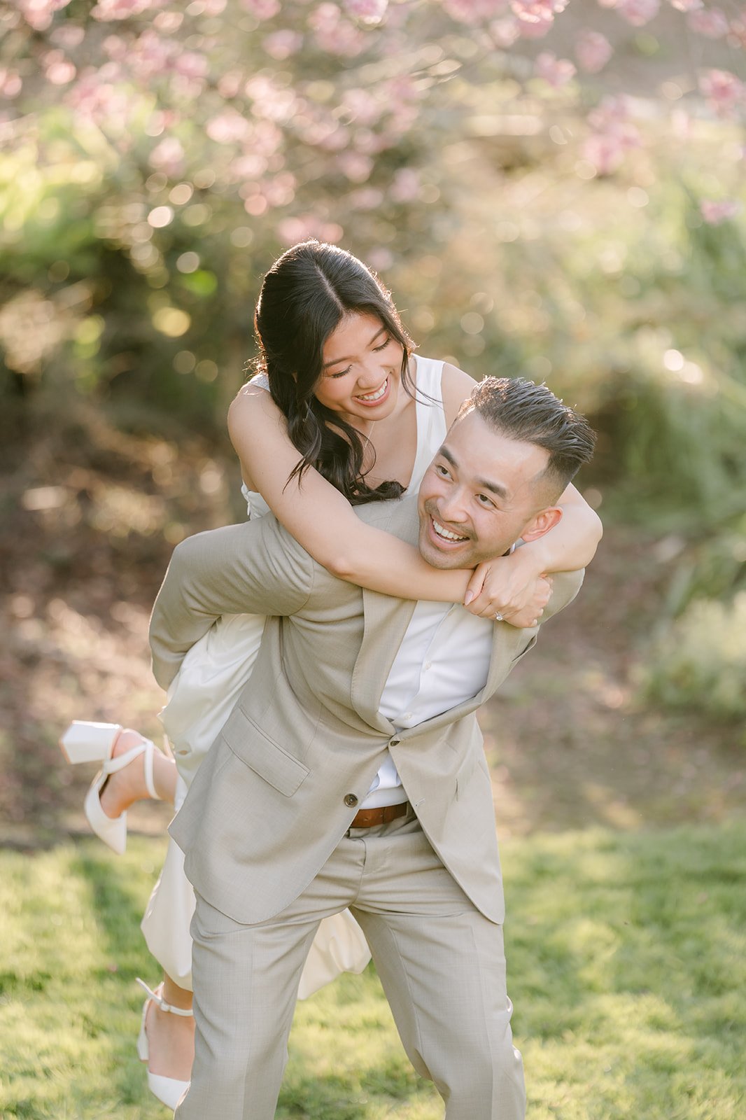Vincent gives Kim a piggyback ride on the lawn.
