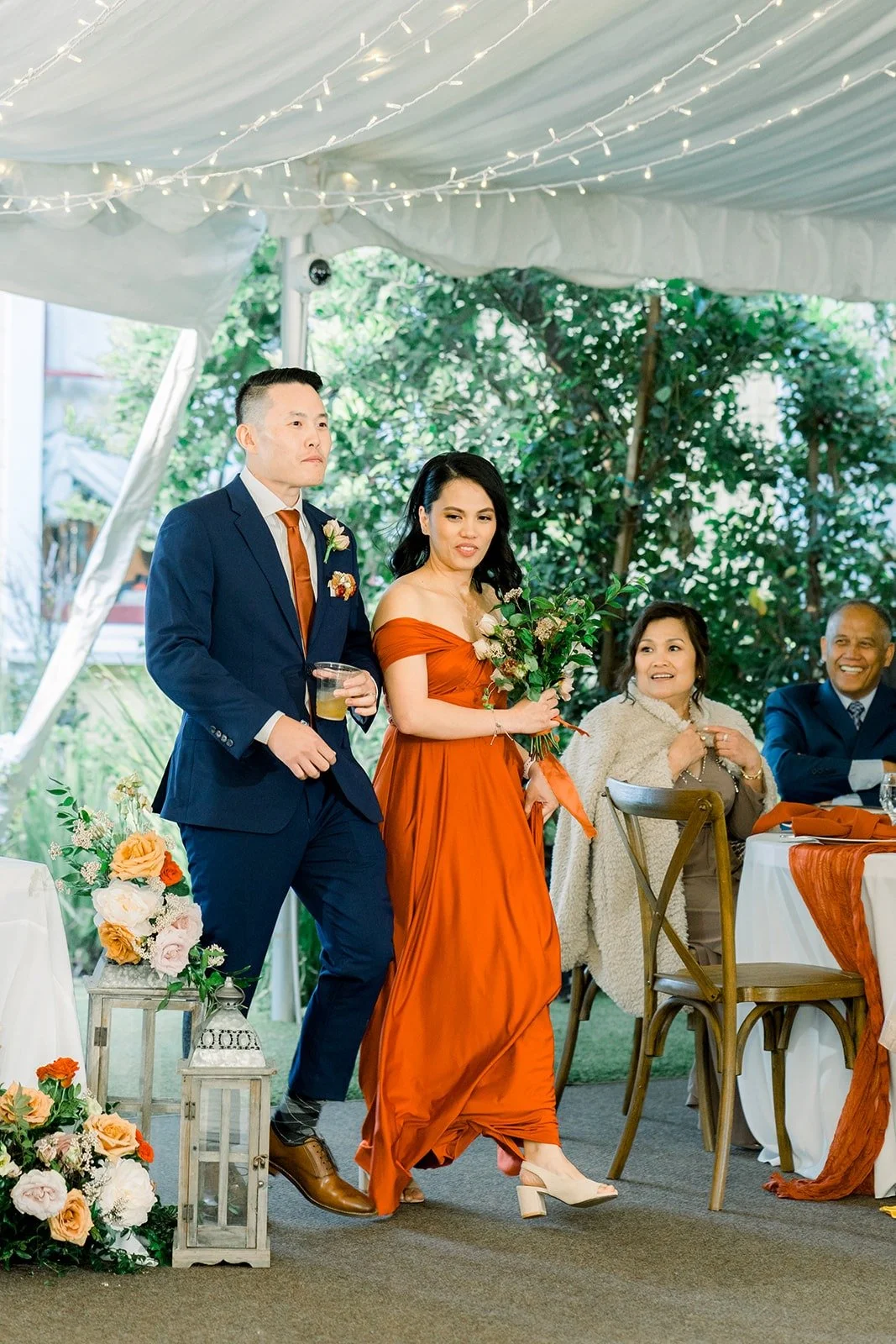 Hannah and Vincent making their grand entrance into the tent