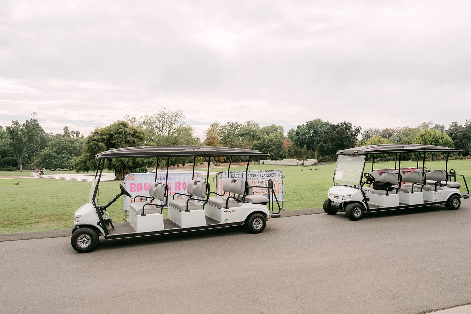 Trams waiting to bring guests through the Arboretum.