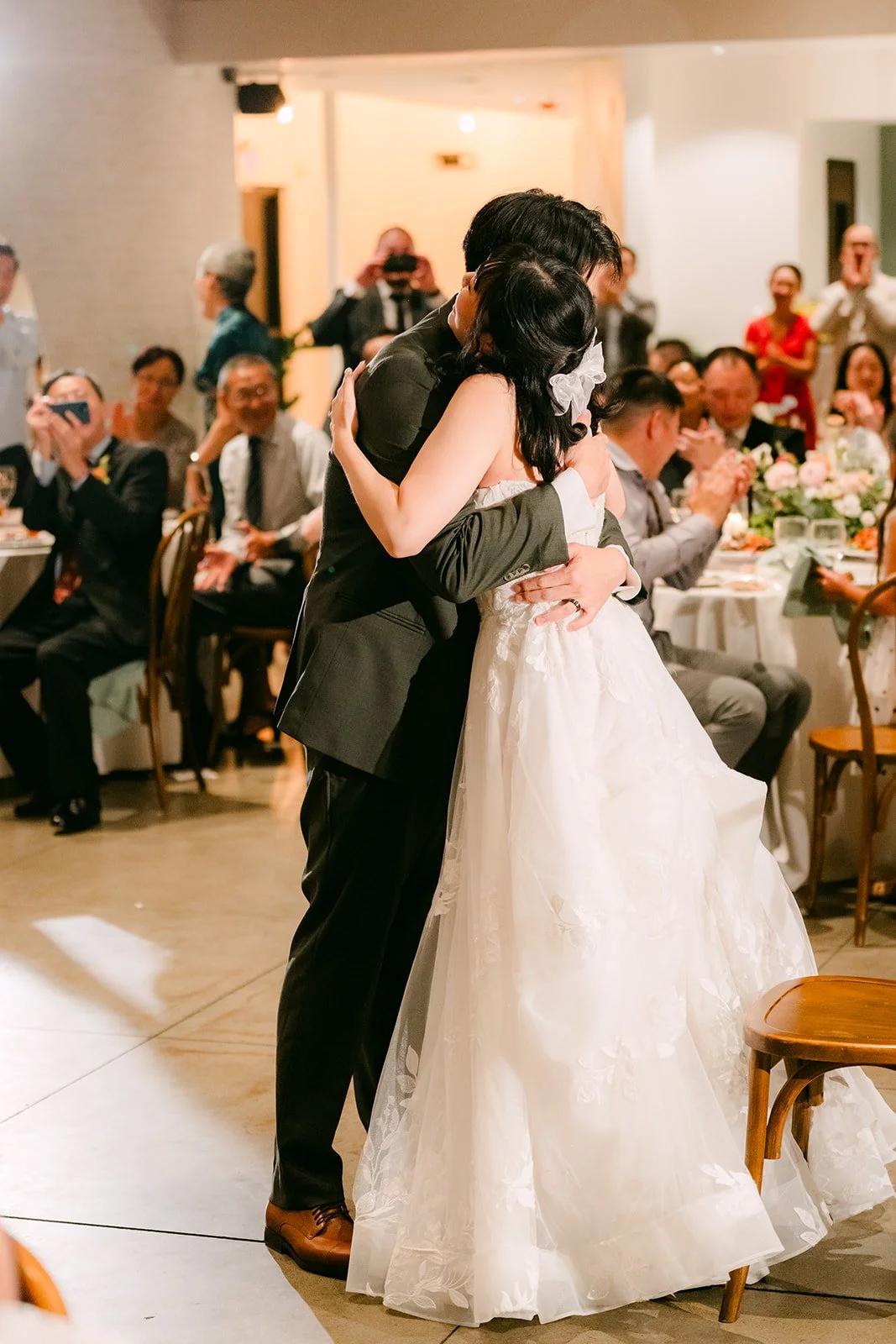 Vivian and Alex hugging after the surprise dance