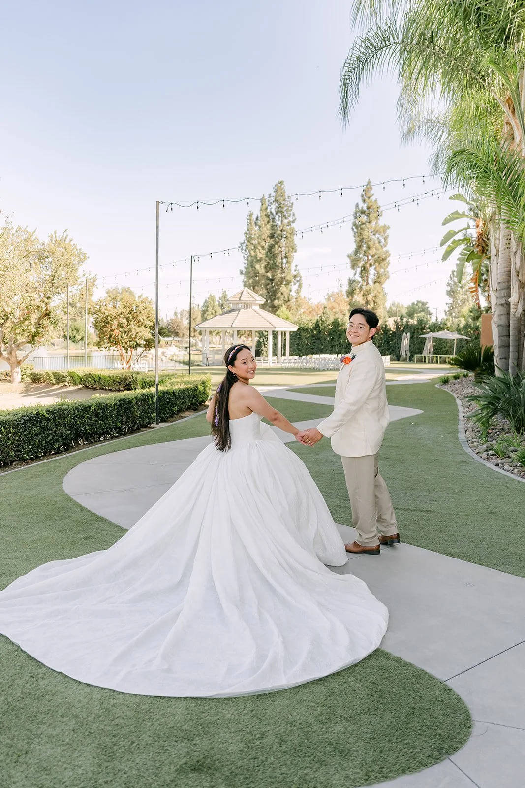 Angela spinning her gown on the lawn