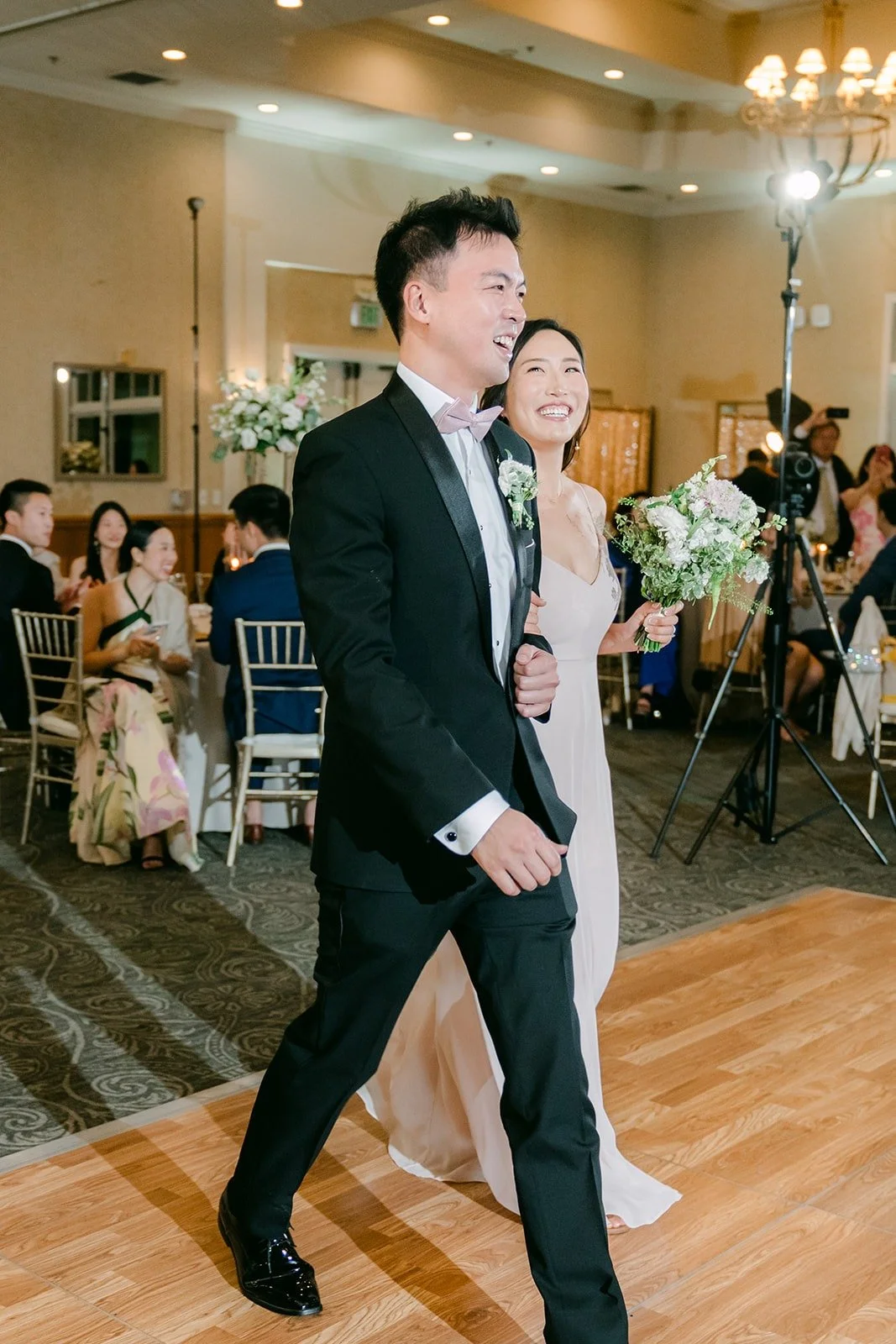 Kristine and William making their grand entrance, Kristine in her second dress