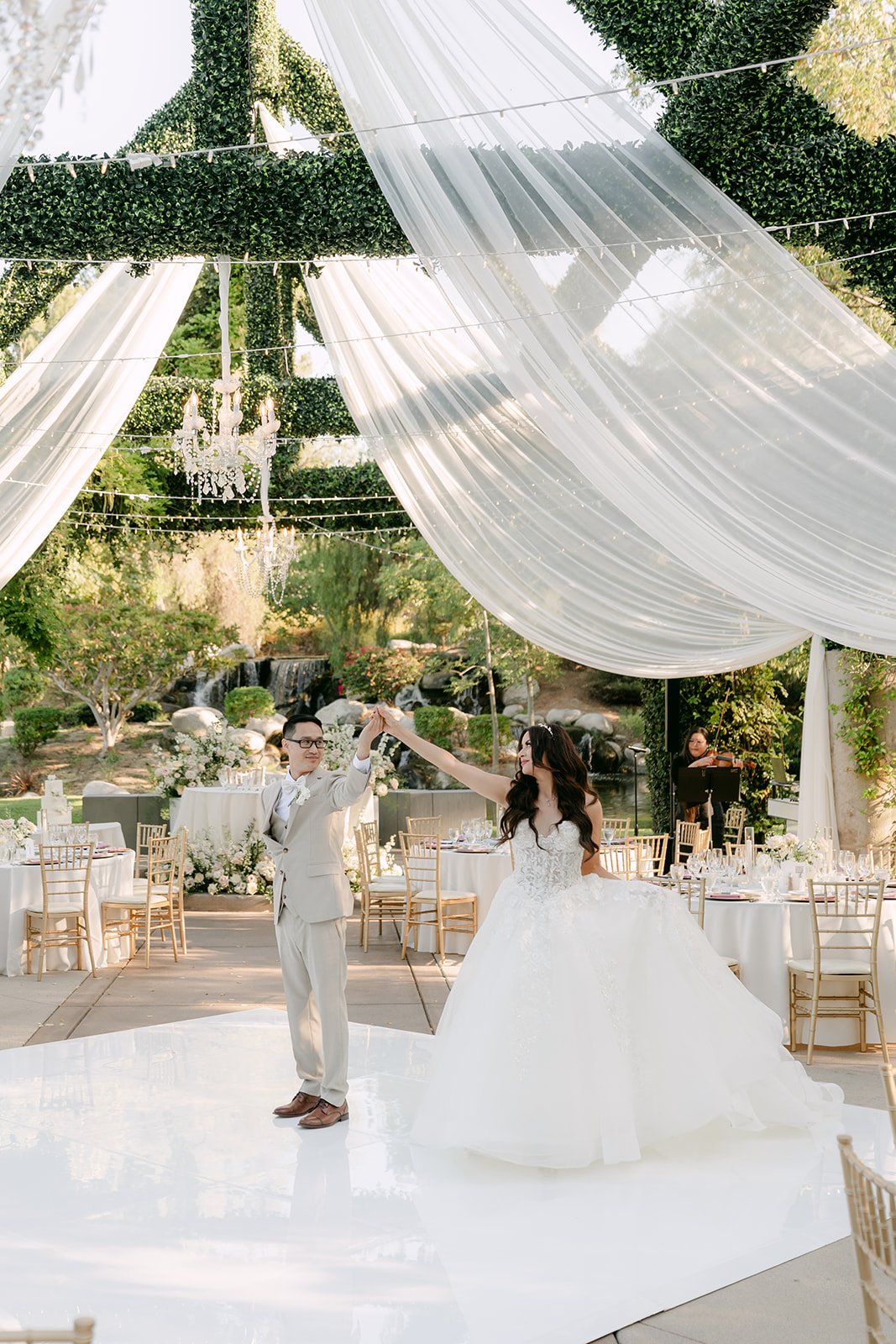 Sandra and Kevin practicing their first dance in the reception area.