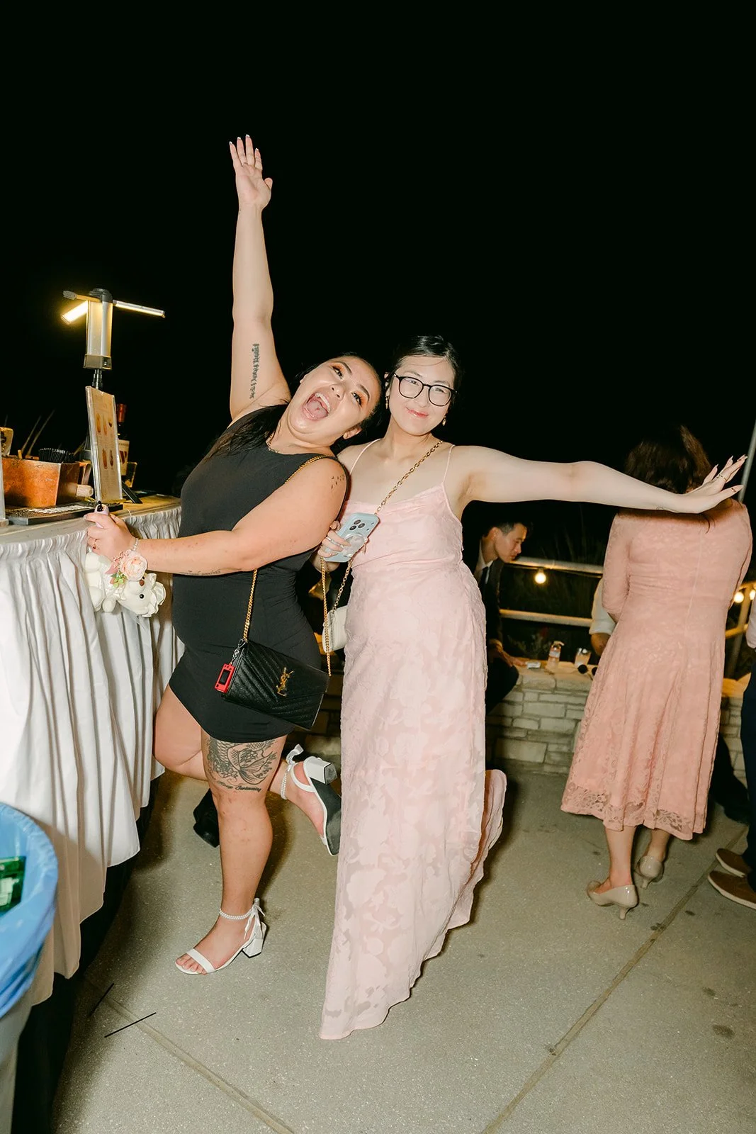 Kim dancing with friends at night