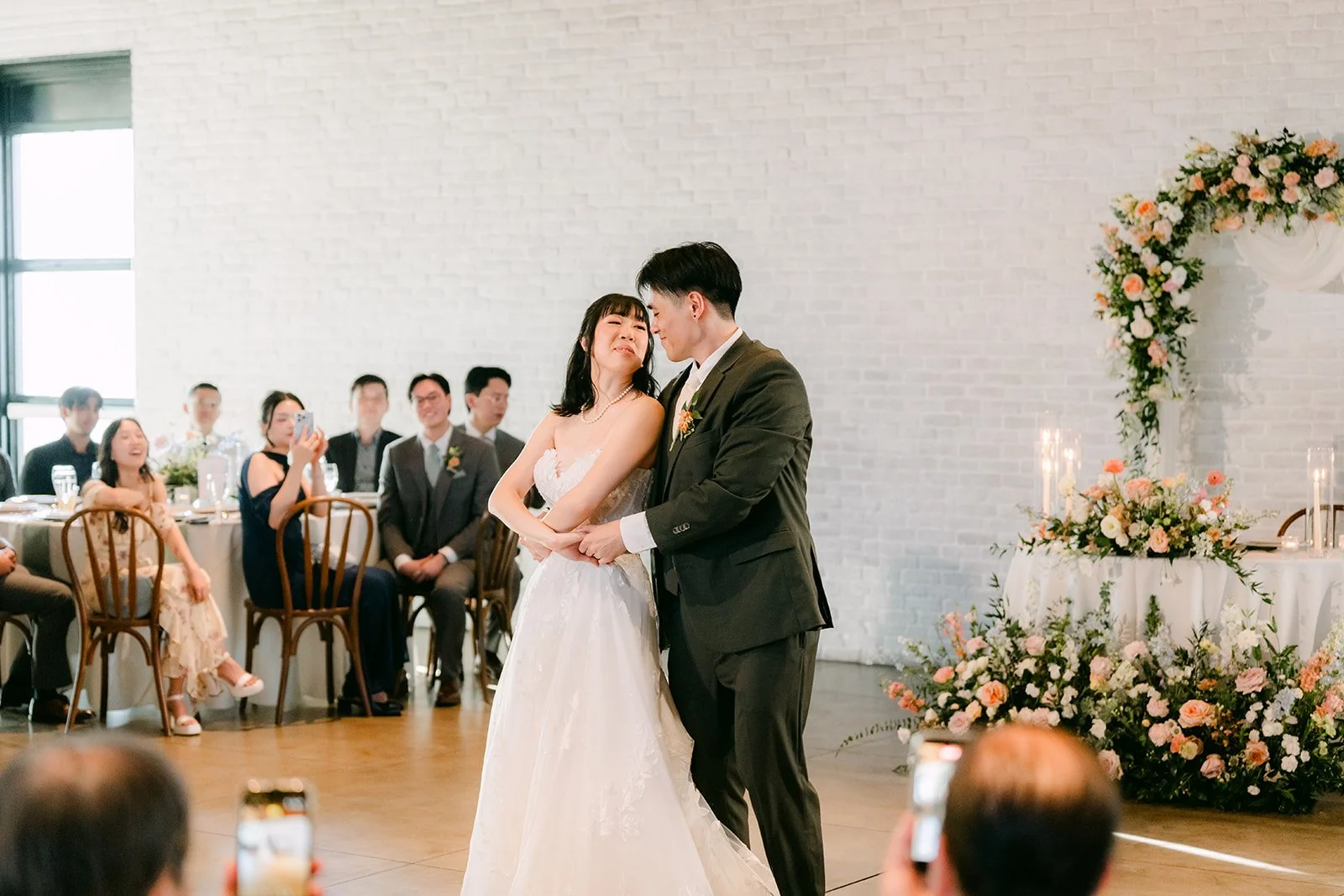 First dance pose in front of the guests