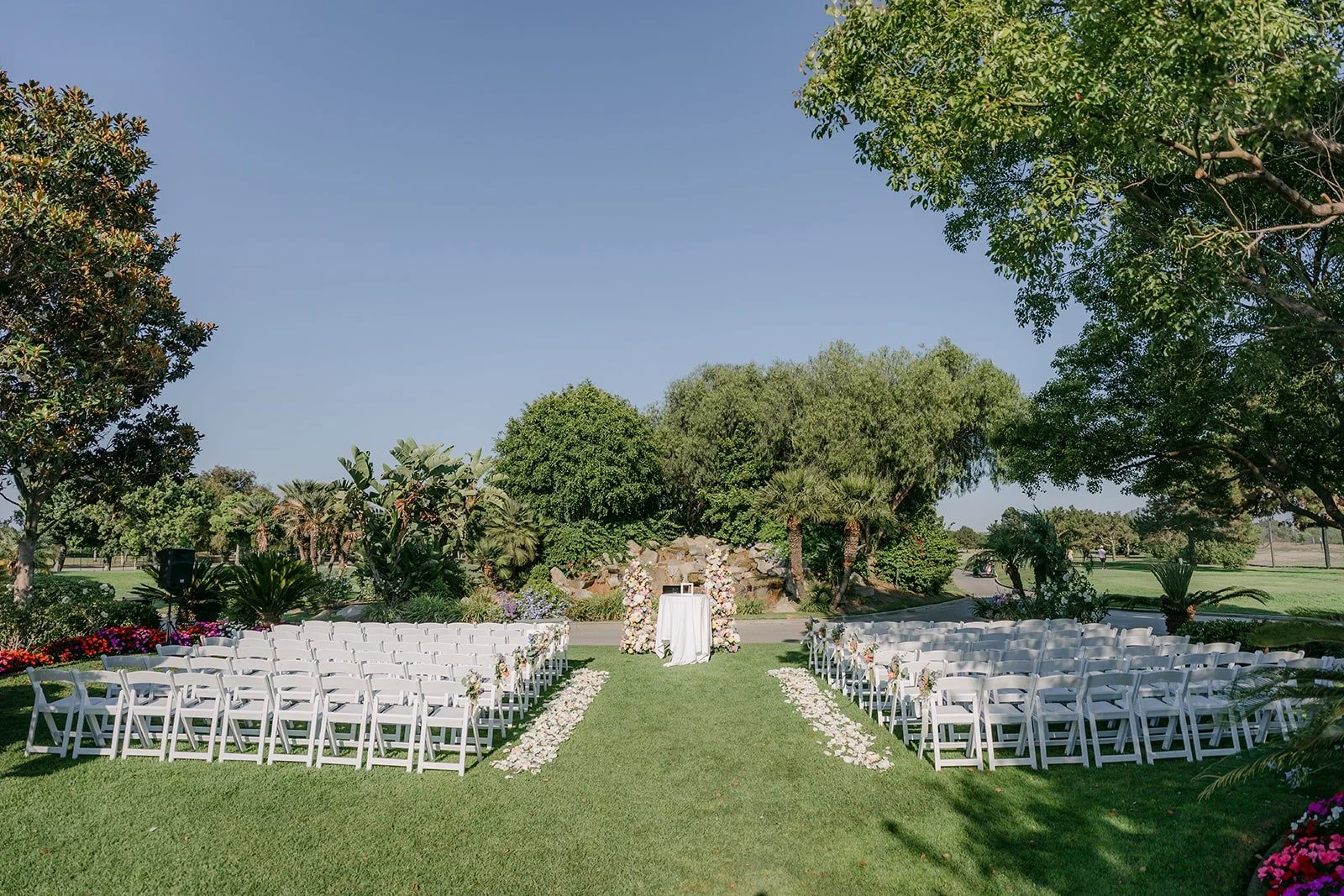 The ceremony lawn at Skylinks Golf Course set with white chairs before guests arrived