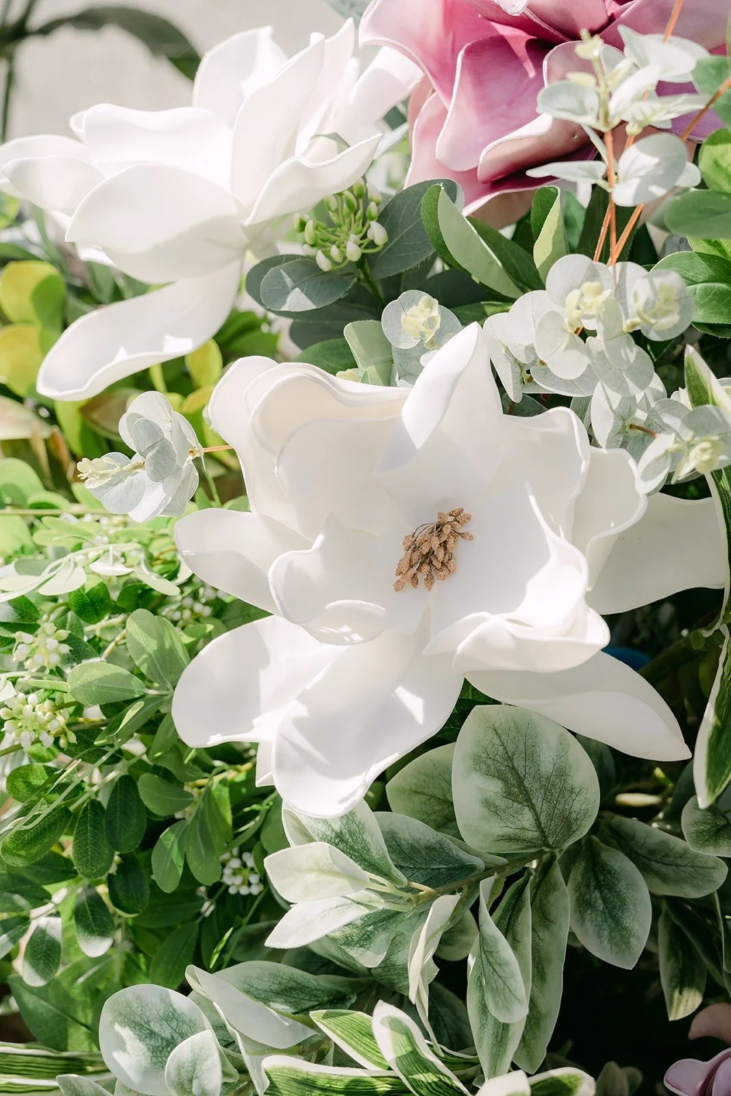 White lilies and greenery from the tea ceremony florals at Amy's family home