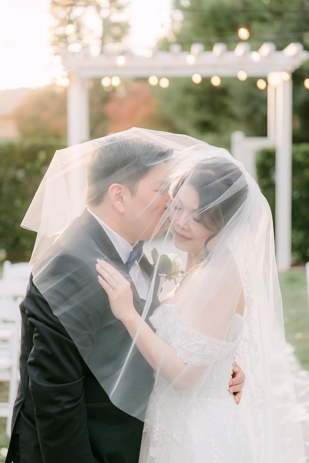 Close up of Sochi and Jay beneath her veil, photographed by One and Only Production