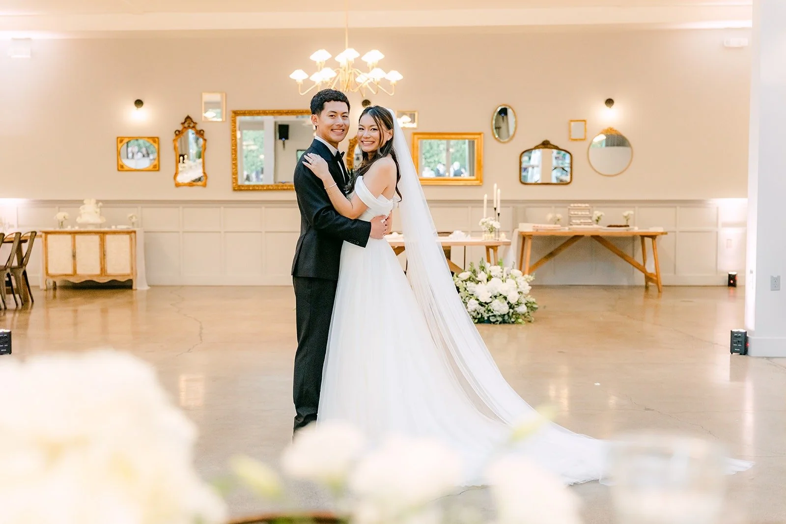 Jadee and Richard in the empty reception room before guests come in