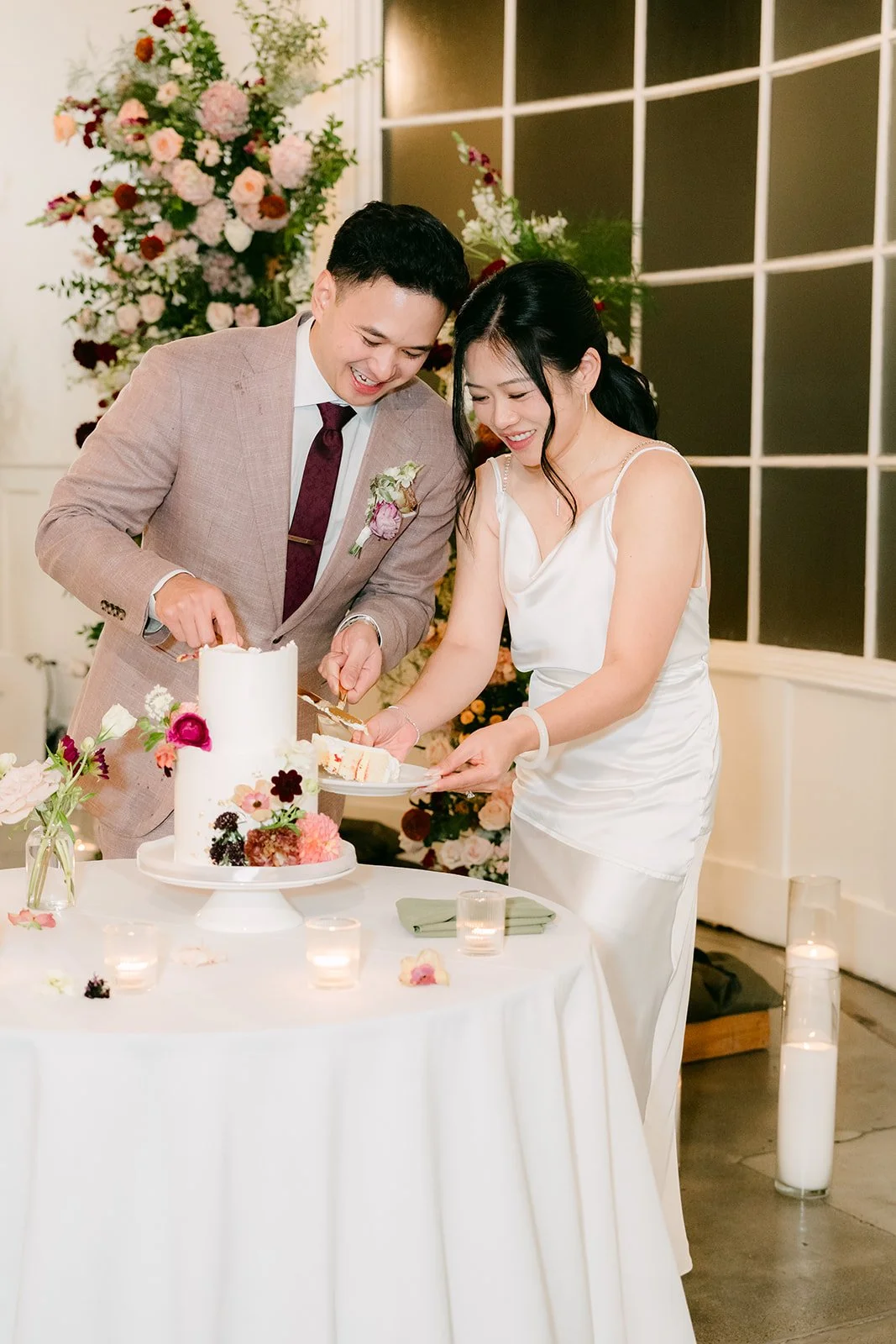 Denise and Michael cutting the cake.
