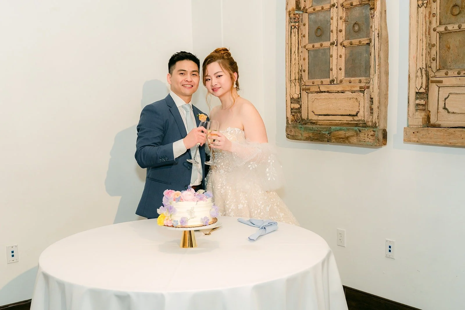 Joanna and Jerrick feeding each other cake