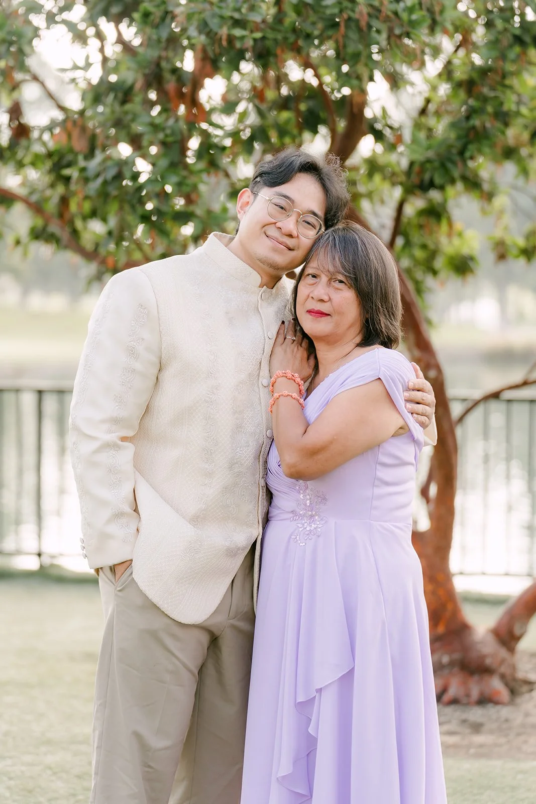 Jacob and his mom under the trees