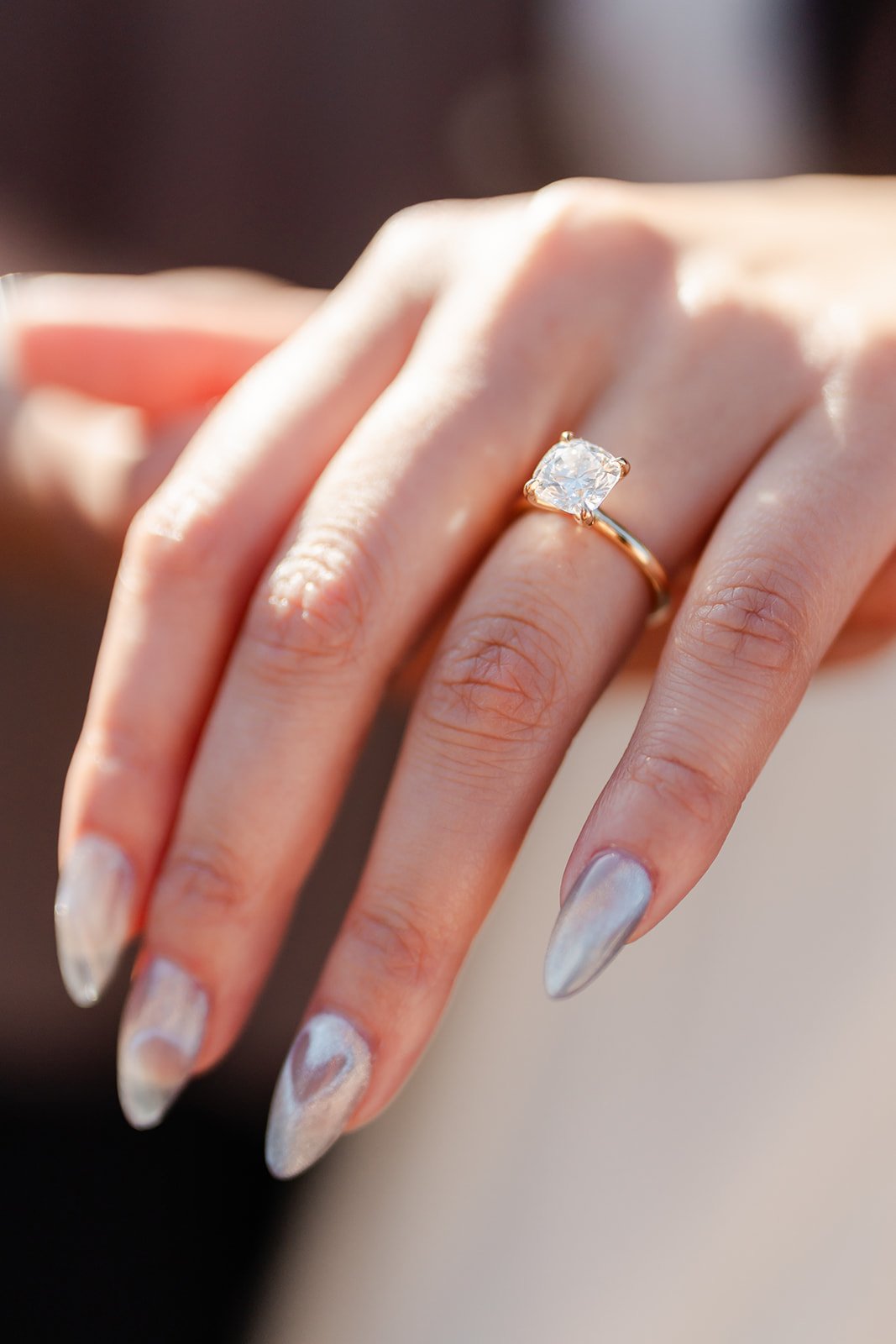 Close-up of Victoria's engagement ring, photographed by One and Only Production.
