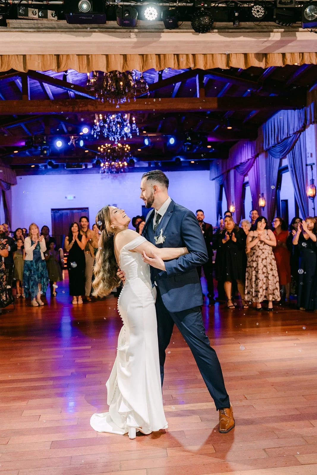 Wide view of the first dance under the chandeliers, photographed by One and Only Production