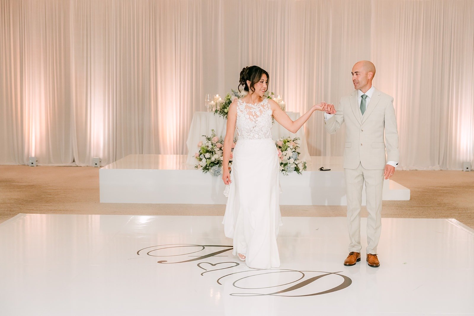 Francesca and Daniel step onto the monogram dance floor for their first dance