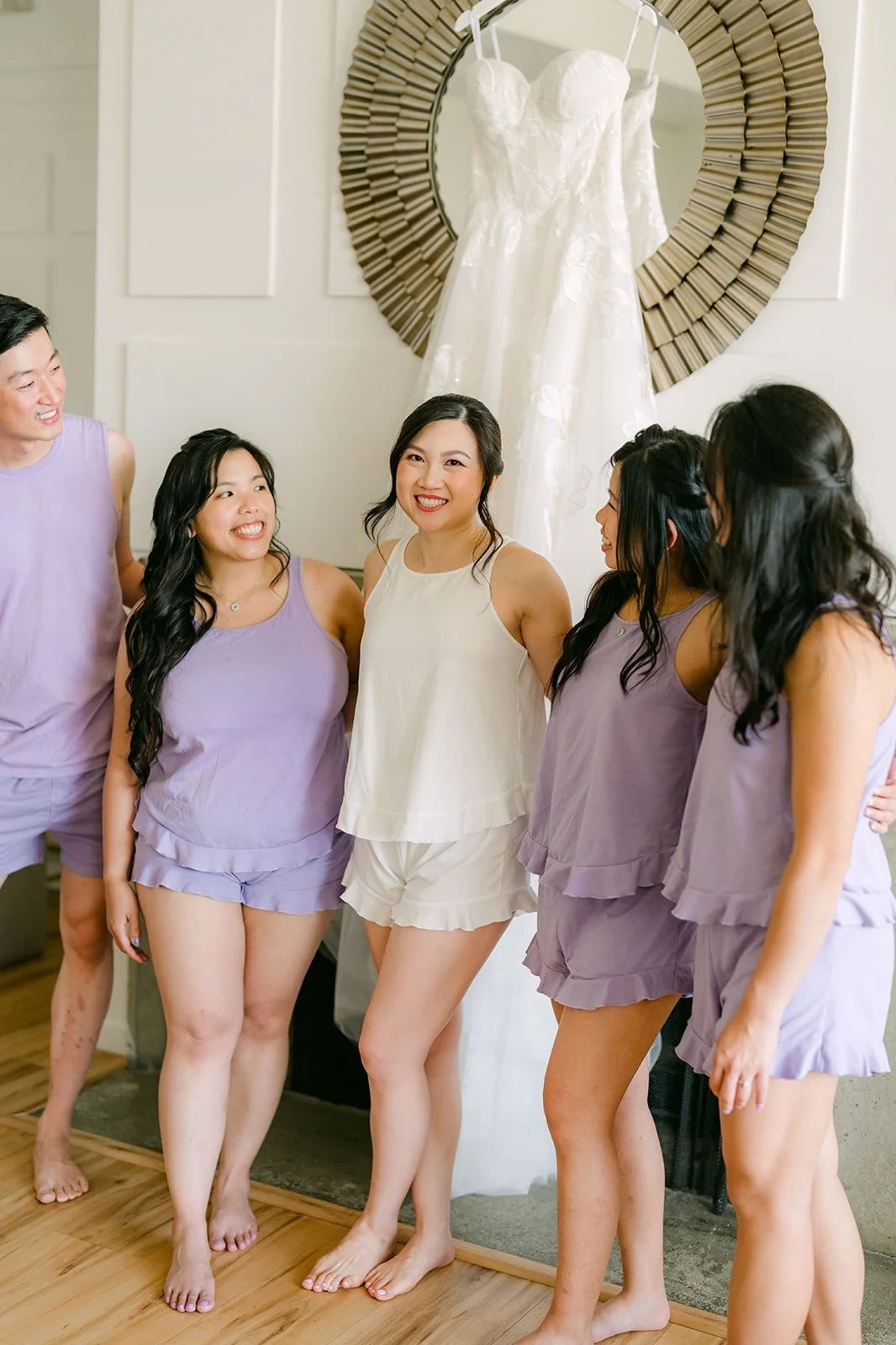Mary laughing with her bridesmaids