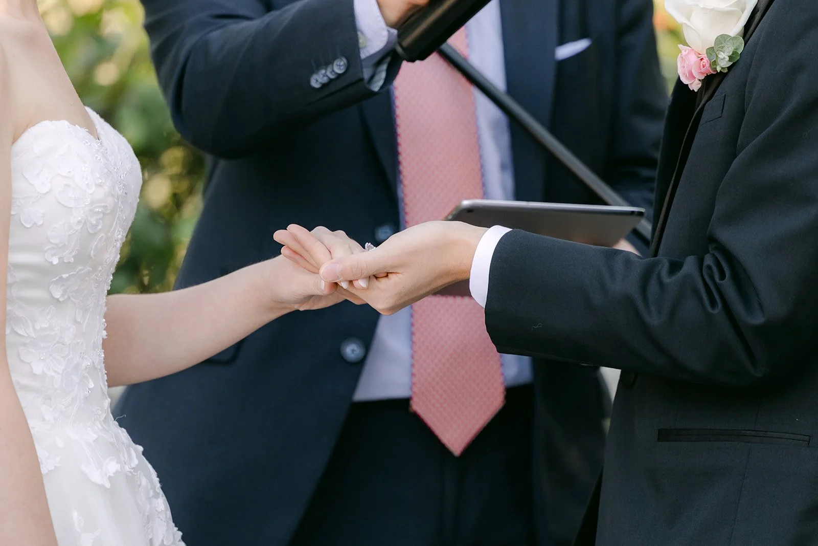 Ring exchange during the Vellano Estate lawn ceremony