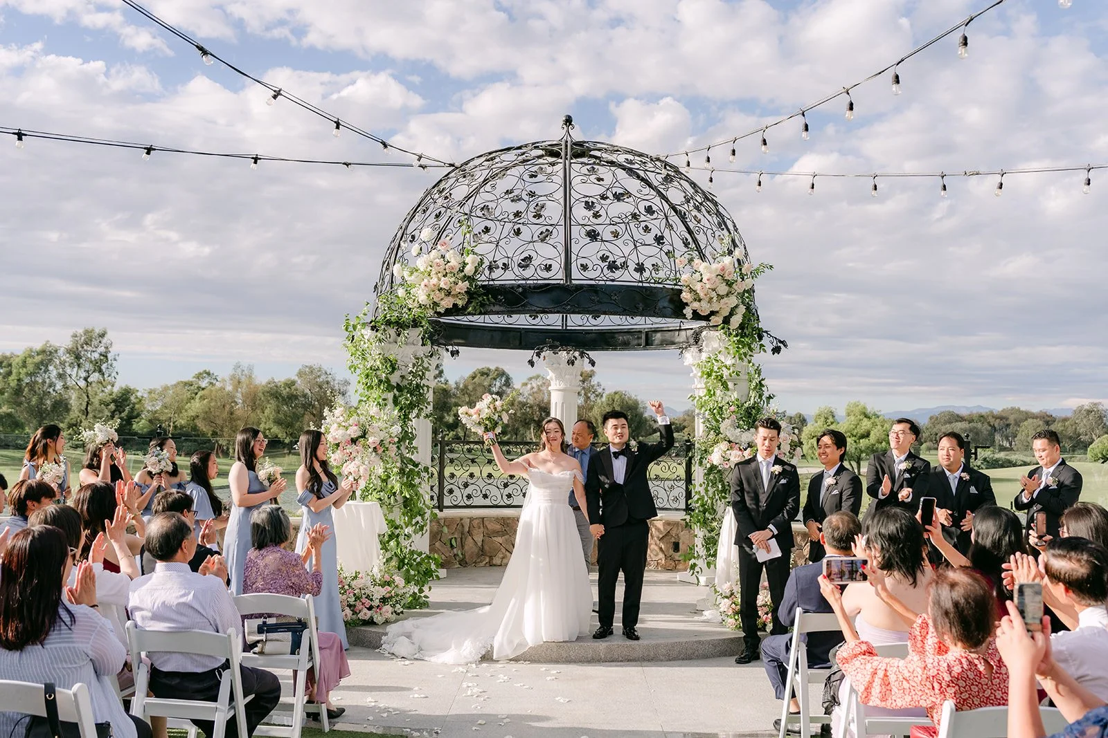 Jessica and Kenny celebrating as newlyweds