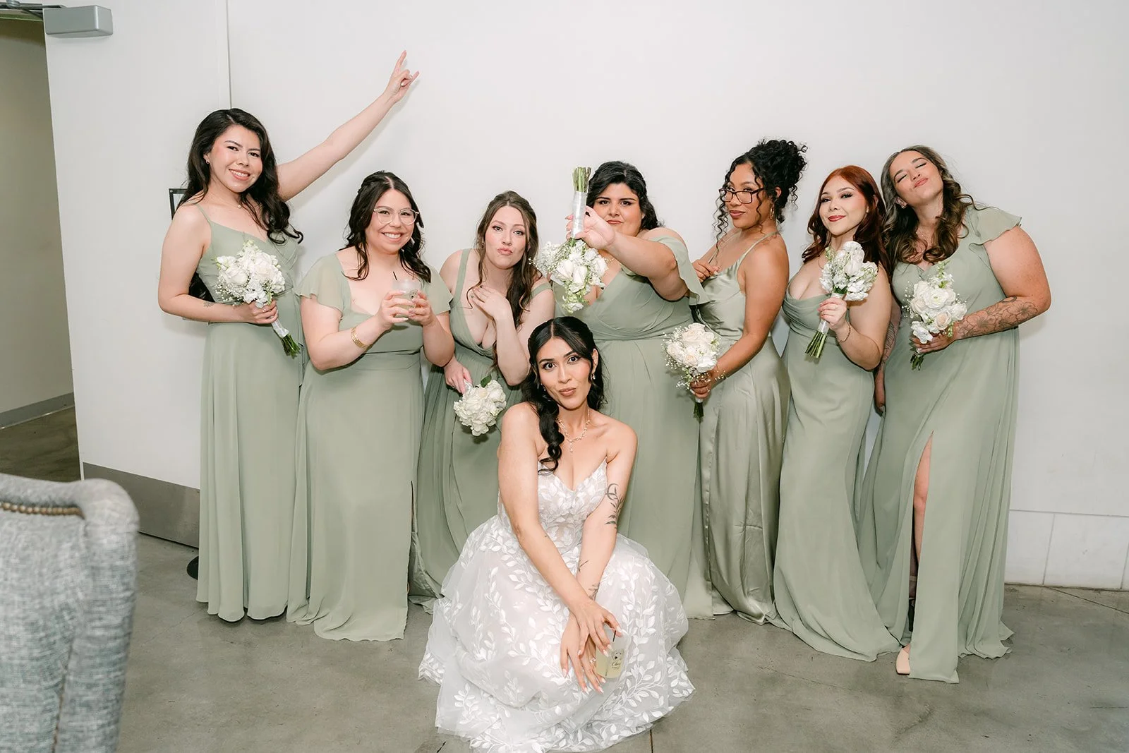 The bridesmaids cheering around Fernanda.