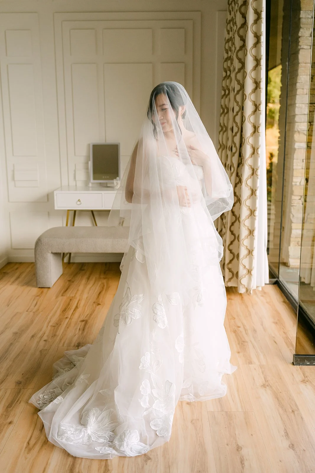 Mary in her gown and cathedral veil