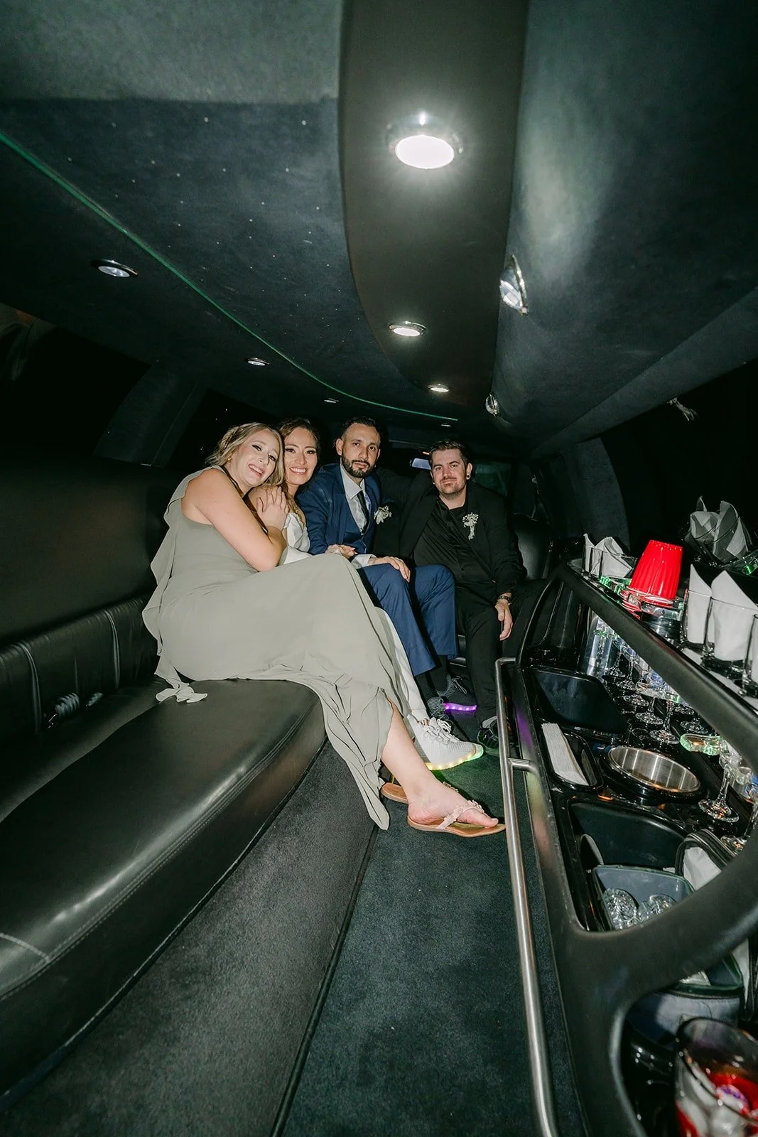 Mariana and Danny inside the limo at the end of the night, photographed by One and Only Production