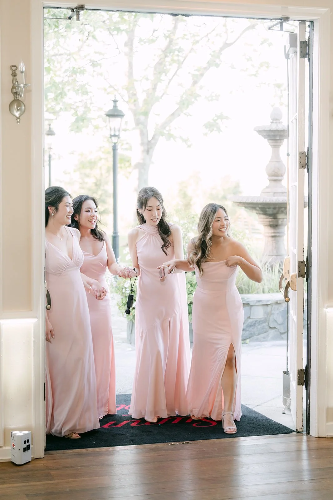 The bridesmaids making their entrance