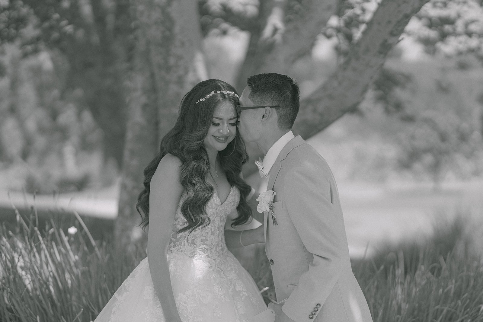 Black and white photo of Sandra and Kevin sharing private vows.