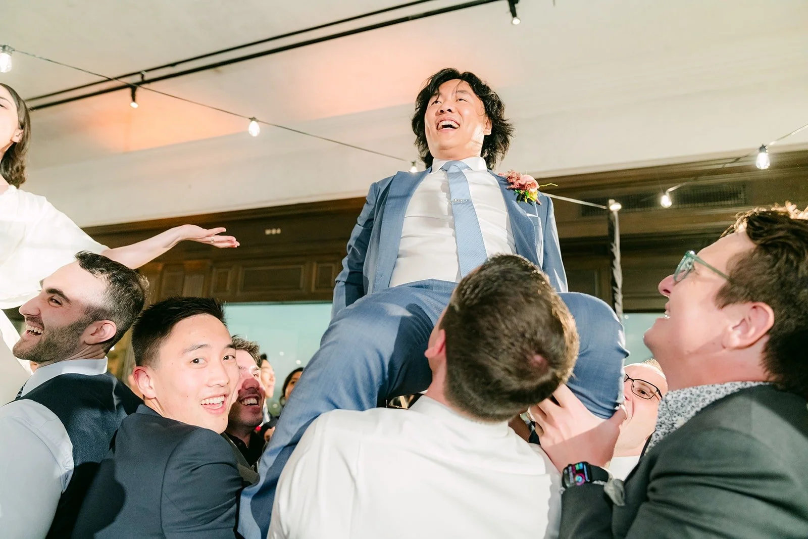 Lifted high above the crowd during the Hora