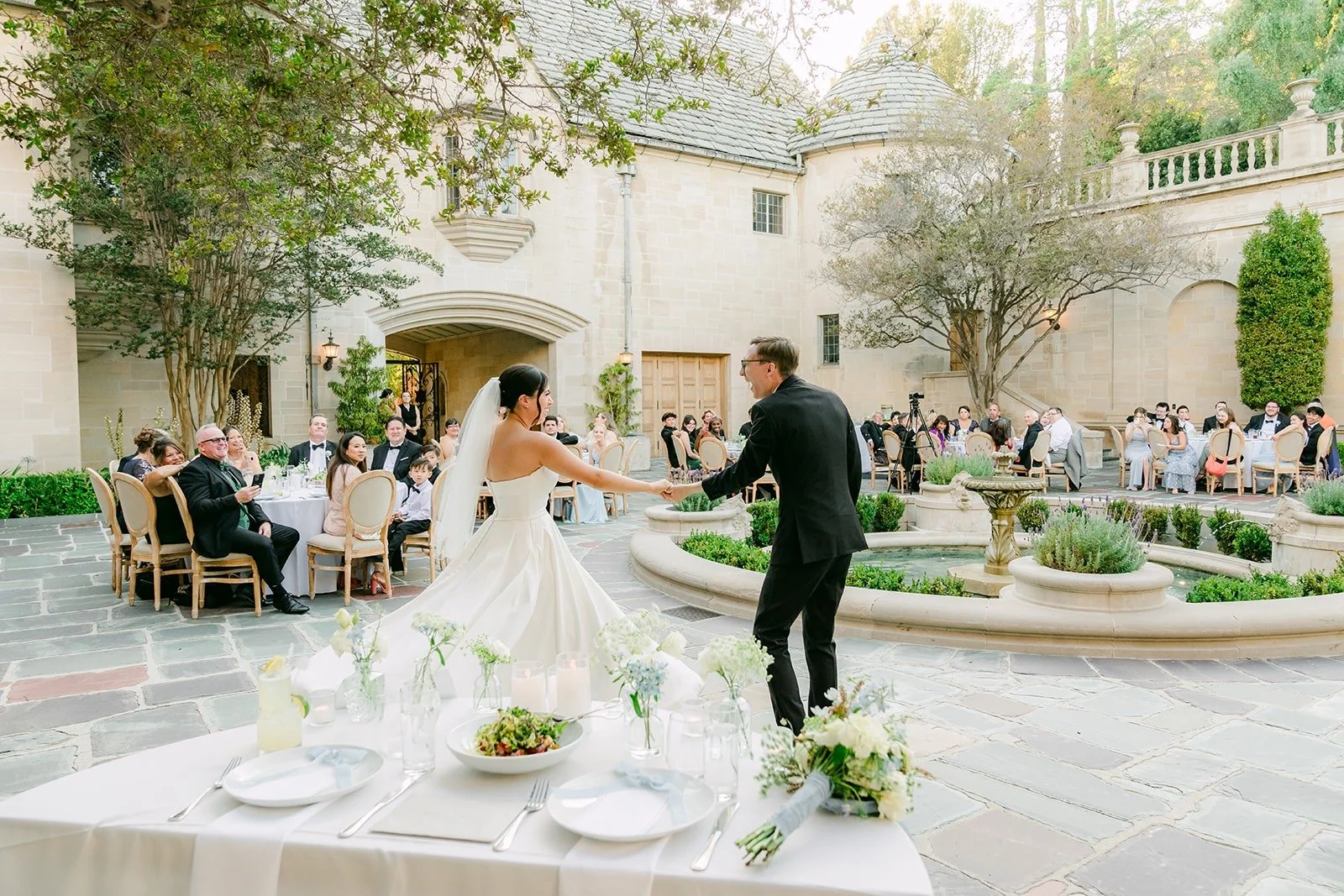 Wide view of the reception courtyard at Greystone Mansion
