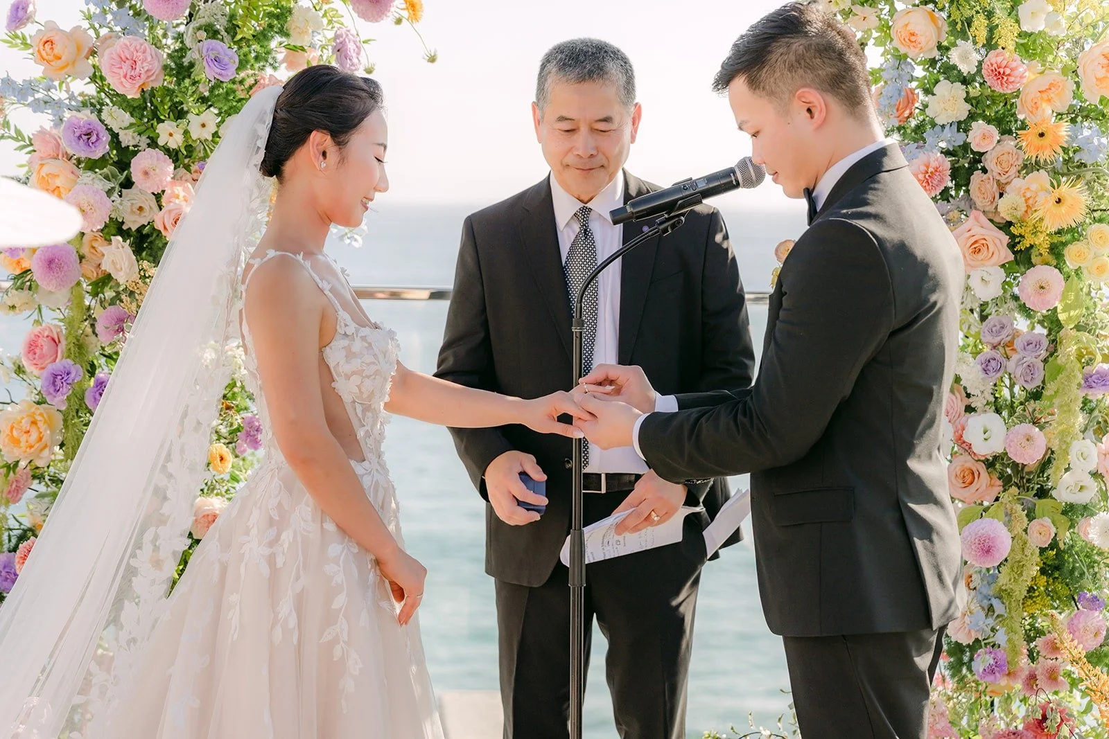 Mario placing the ring on Kylie's finger