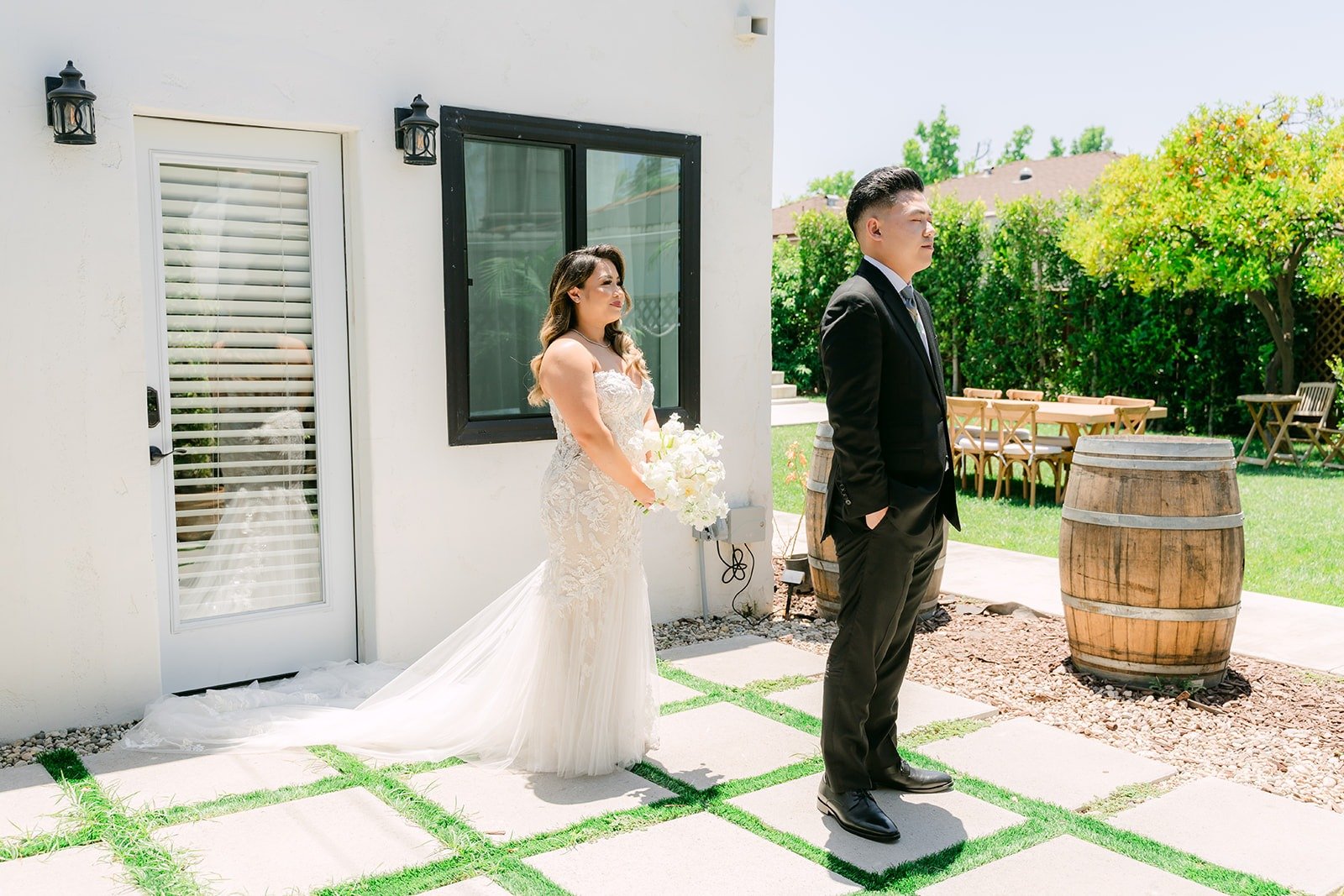 Candice walking up behind Vincent for their first look