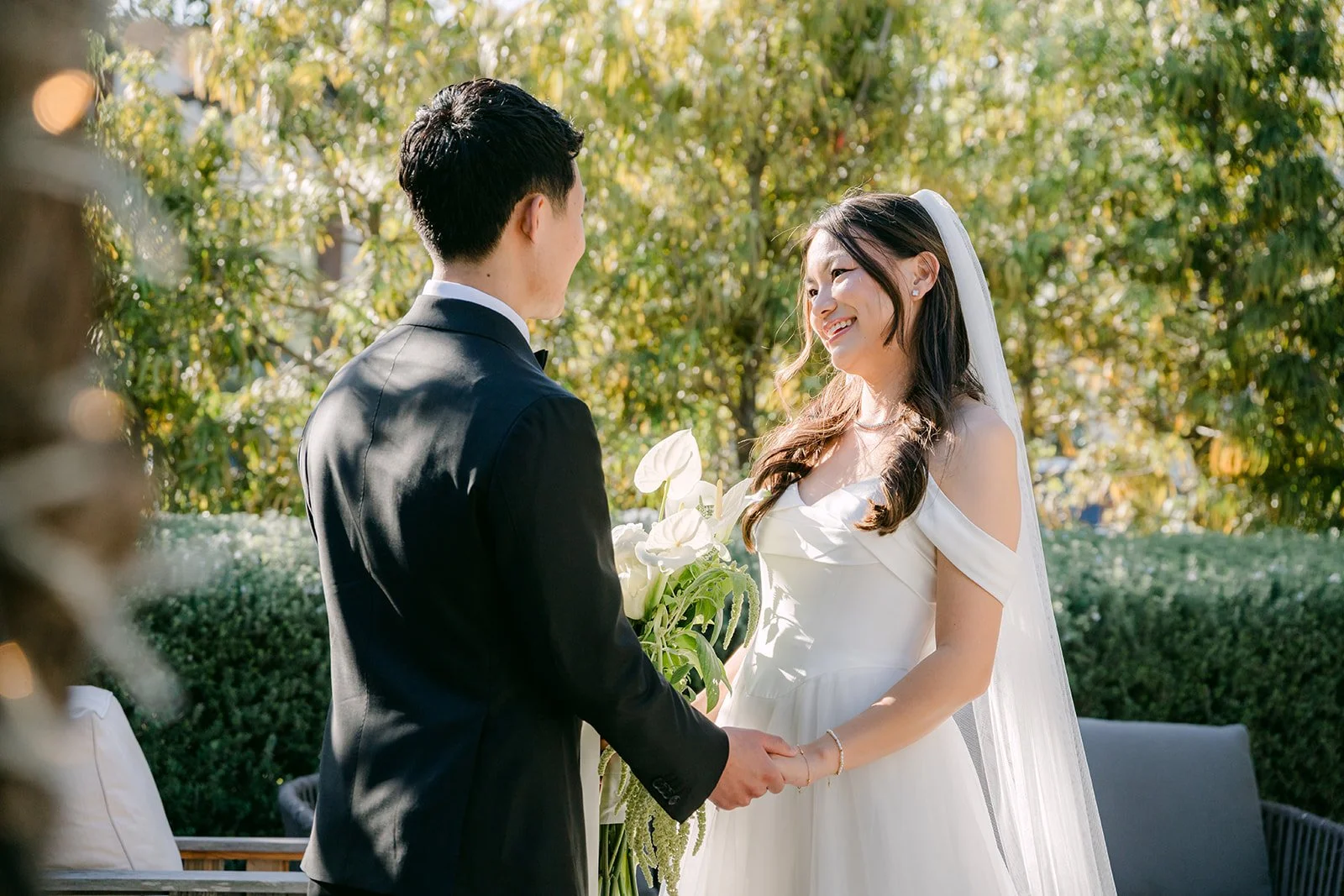 Jadee and Richard holding hands during their first look