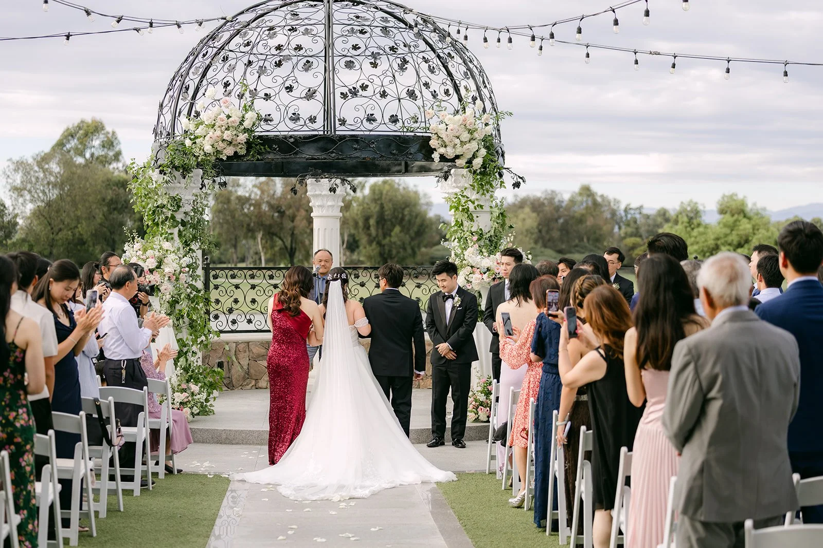 A wide view of the processional toward the gazebo