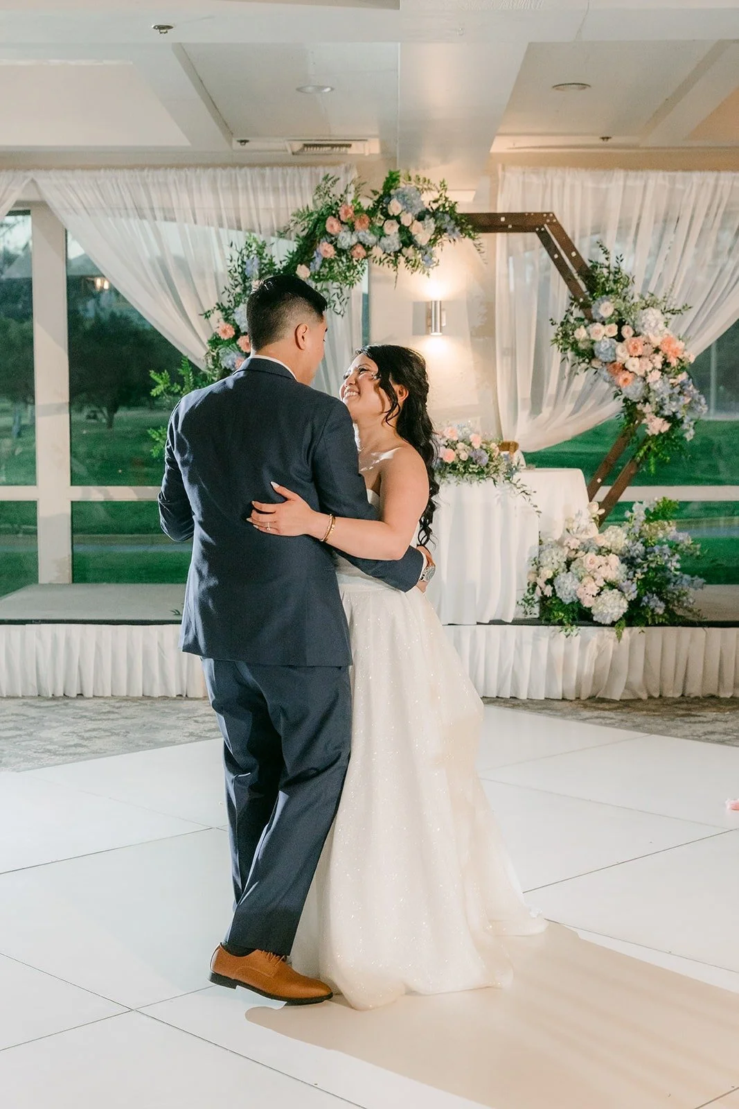 Jordan holding Florence close during their first dance