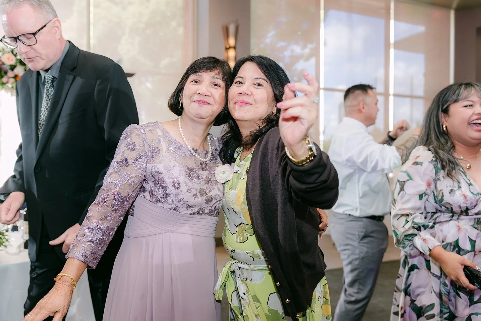 Guests singing along together on the dance floor