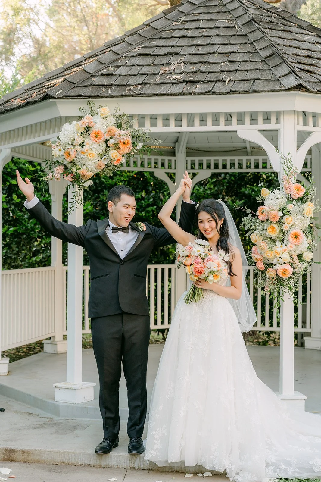 Clarissa and Austin under the pergola after the ceremony