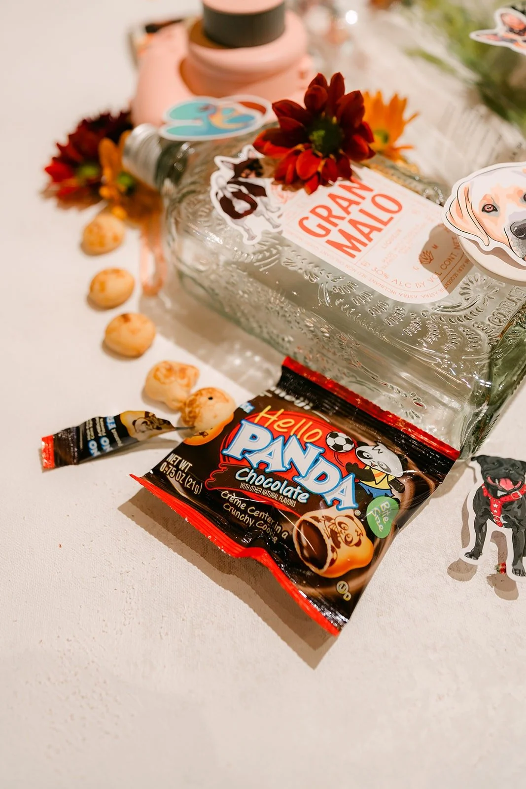 Snack favors piled on a table, photographed by One and Only Production