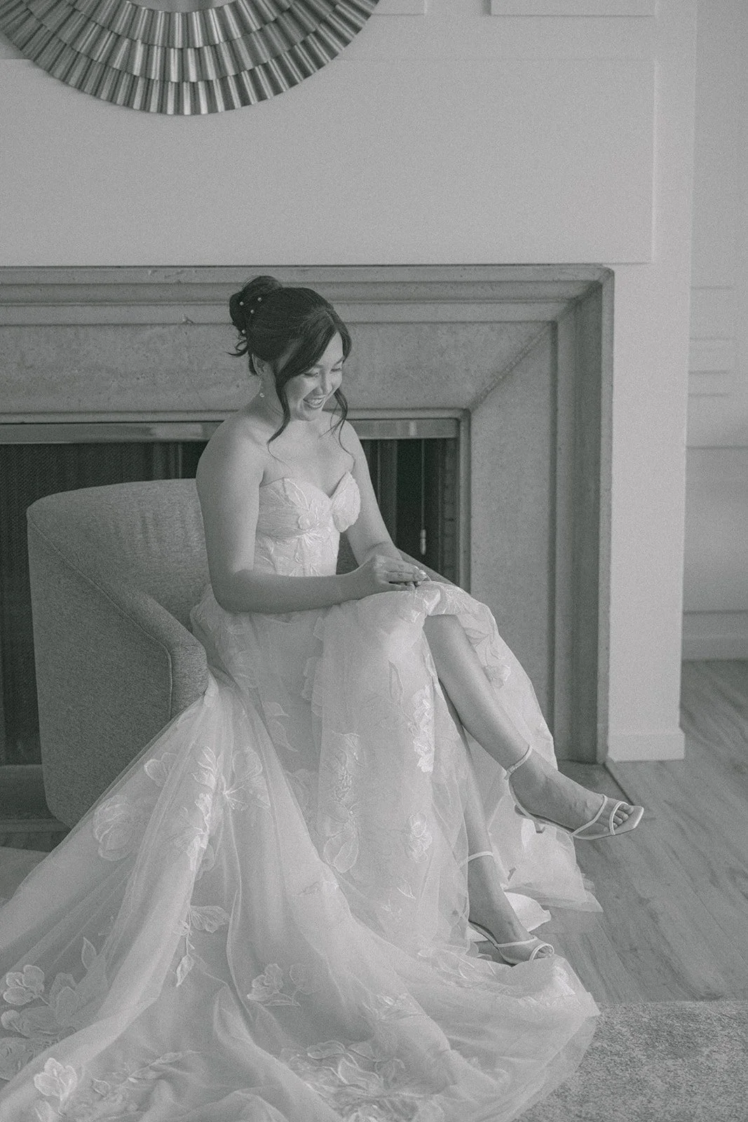 A black and white moment as Mary puts on her shoes