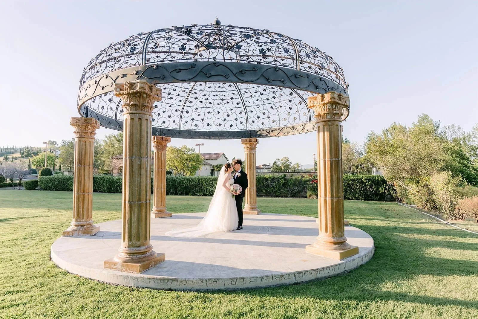 Victoria and Tony at the iron rotunda at Vellano Estate