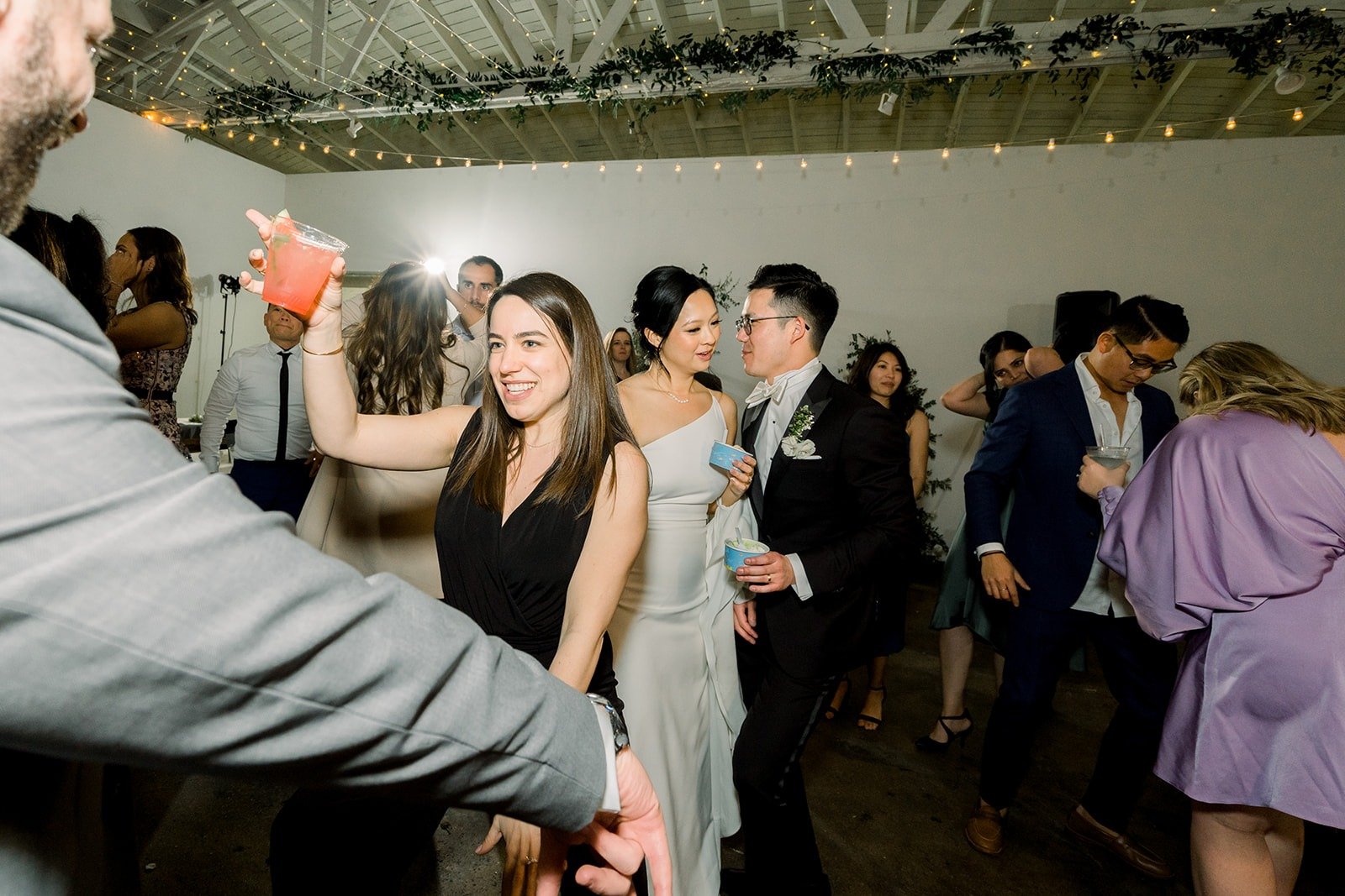 Guests dancing across the floor