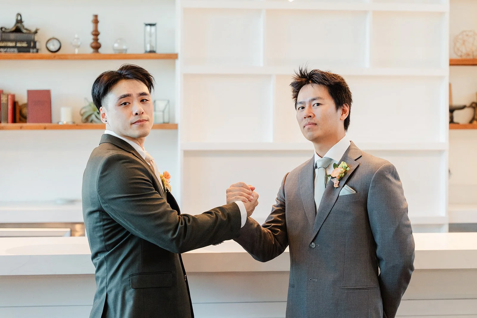 Alex shaking hands with a groomsman