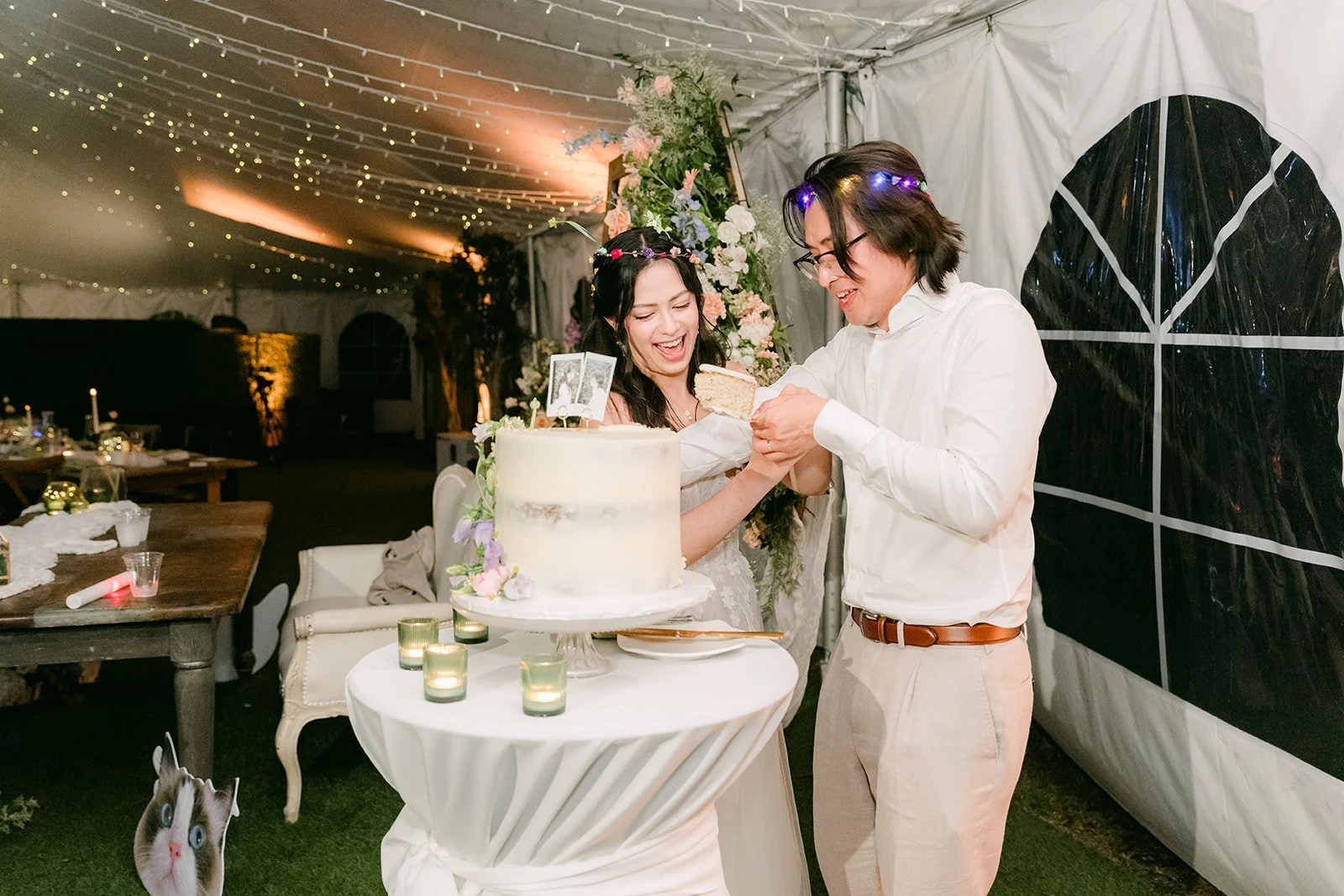 Kat and Mike cutting their wedding cake