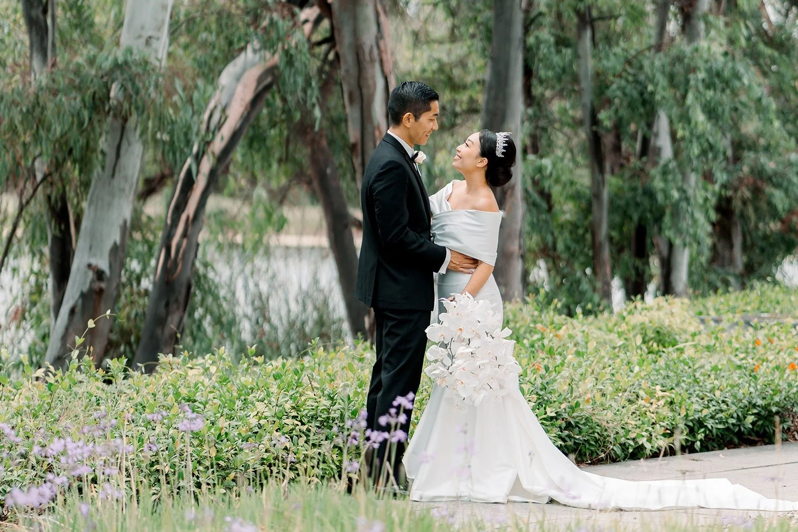Steven and Jacinda among the trees on the church grounds