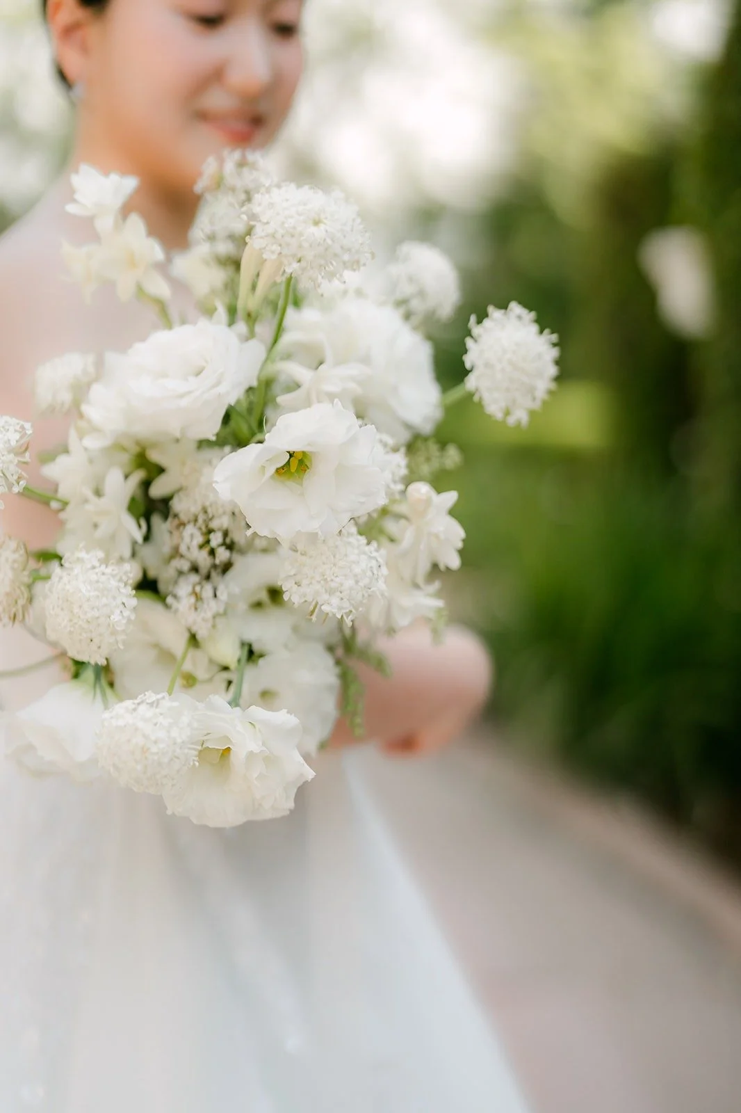 Close up of Amy's white garden rose bouquet