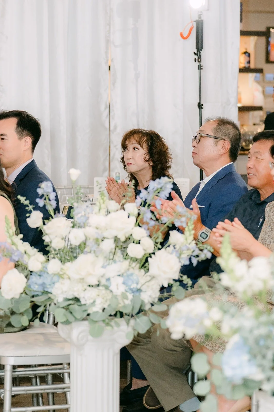 Family watching the ceremony from the front row