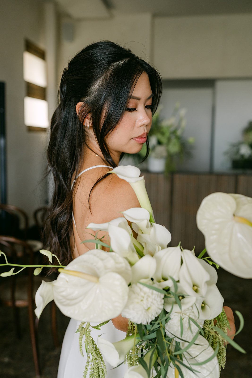 Justine with her white anthurium bouquet