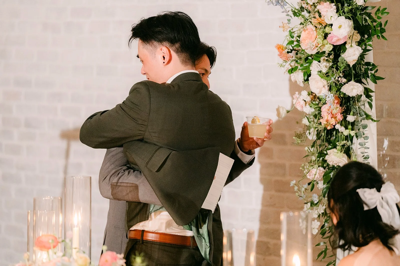 Alex sharing a hug during the speeches